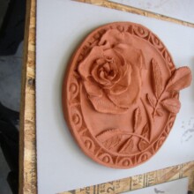 Clay State, in-progress COLUMBARIUM MEDALLION with “Rose” detail for Old City Cemetery in Lynchburg, VA.