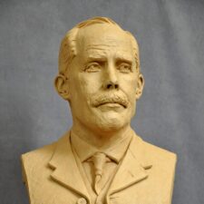 Sculpture of GEORGE CARTER in progress and in its clay state.