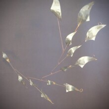 This mobile piece is titled DIVE. The artists used aluminum and plated steel for this mobile.