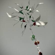 Mobile created by artist Richard Pumphrey, titled GROWTH; This mobile maquette is made from Glass and Aluminum.