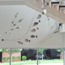 Mobiles by Richard Pumphrey at an exhibition.