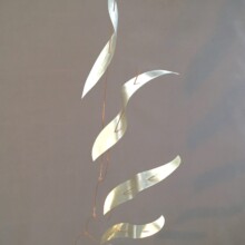 "TLALOC" is the name of this mobile created with aluminum, plated steel, and glass.