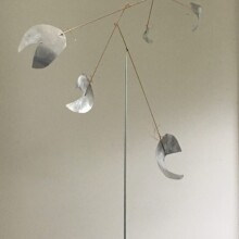 Mobile art by Richard Pumphrey, titled "ASCENDING MOBILE" made with aluminum and steel.