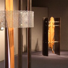 Image of Richard Pumphrey's woodcarvings COMPROMISED VI (in the foreground) and COMPROMISED VII (in the background.)