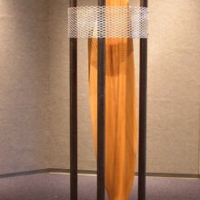 Woodcarving by Richard Pumphrey titled "COMPROMISED VI" and made with wood, steel, aluminum.